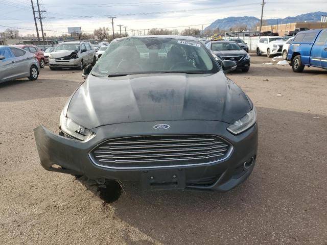 Photo 5 from auction – 2015 FORD FUSION SE with VIN 3FA6P0PU0FR173952