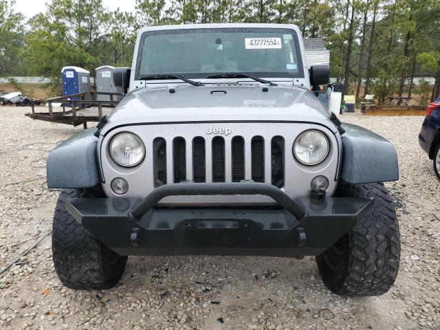 Photo 5 from auction – 2014 JEEP WRANGLER U with VIN 1C4BJWDG1EL107645