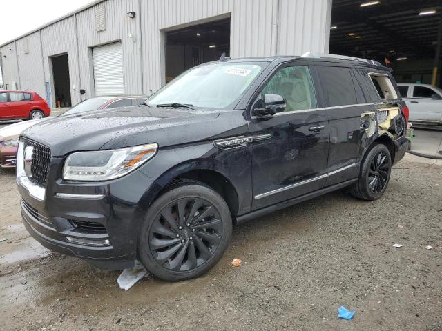 LINCOLN NAVIGATOR 2021 with VIN 5LMJJ2LTXMEL18938 - Photo from auction