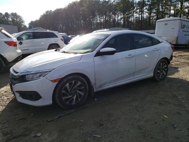 HONDA CIVIC EX 2017 with VIN 2HGFC2F72HH530819 - Photo from auction