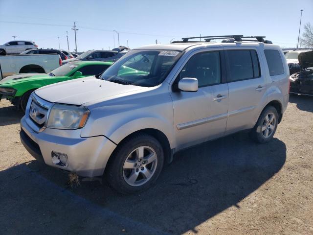 HONDA PILOT EXL 2011 with VIN 5FNYF4H55BB011833 - Photo from auction