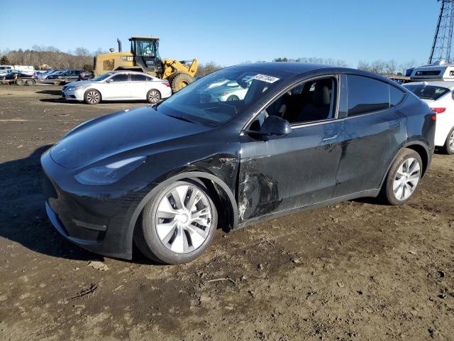 TESLA MODEL Y 2023 with VIN 7SAYGAEE3PF925301 - Photo from auction