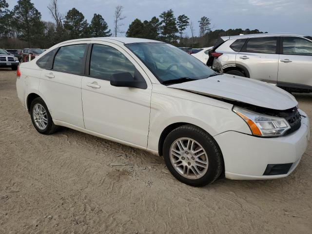 Foto 4 de la subasta – 2010 FORD FOCUS con VIN 1FAHP3FN7AW205189