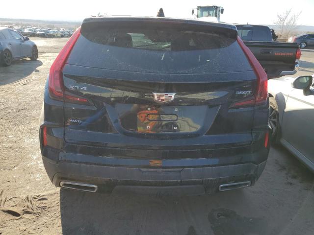 Photo 6 from auction – 2024 CADILLAC XT4 PREMIU with VIN 1GYFZDR48RF101028