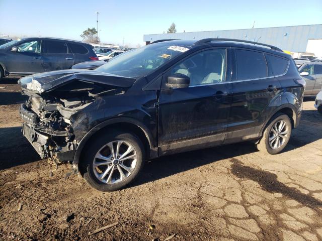 FORD ESCAPE SE 2018 with VIN 1FMCU0GD4JUC15882 - Photo from auction