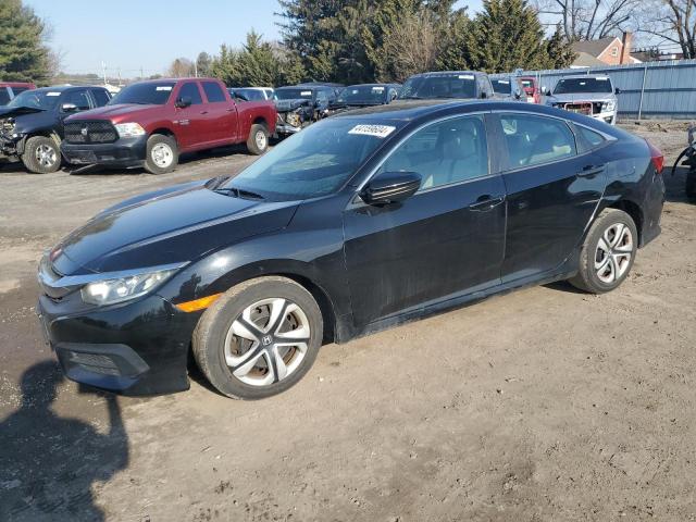 HONDA CIVIC LX 2016 with VIN 19XFC2F51GE053131 - Photo from auction