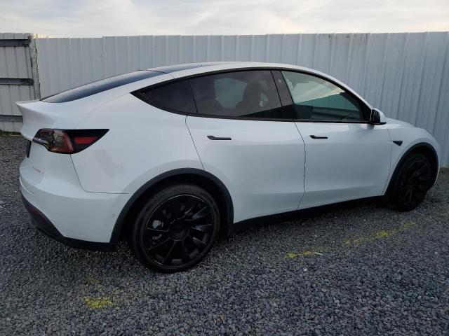 Photo 3 from auction – 2022 TESLA MODEL Y with VIN 7SAYGDEE4NF385634