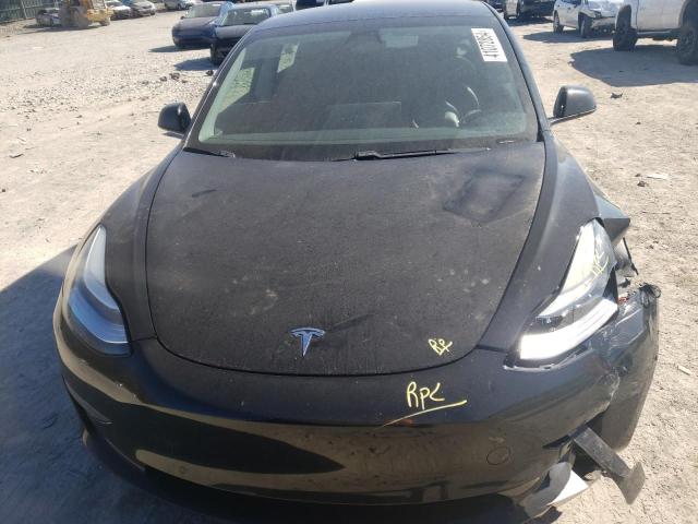 Photo 11 from auction – 2021 TESLA MODEL 3 with VIN 5YJ3E1EA1MF854461