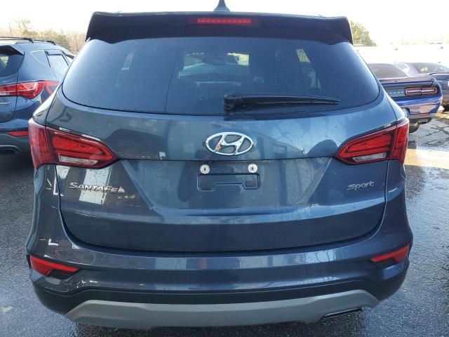 Photo 6 from auction – 2017 HYUNDAI SANTA FE S with VIN 5NMZU3LB4HH025330