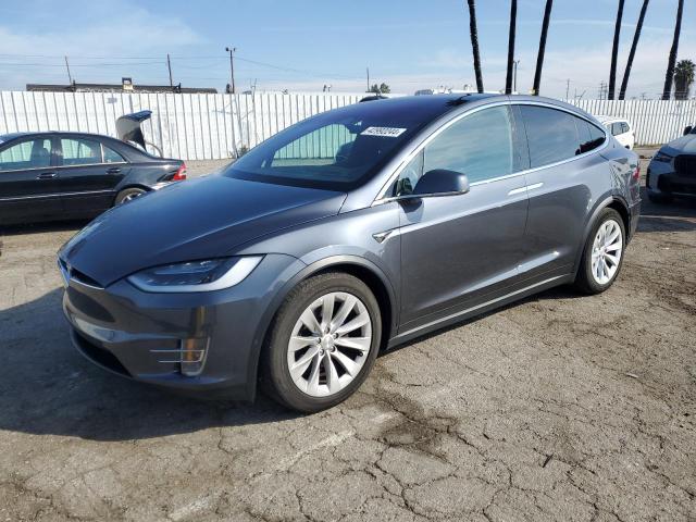 TESLA MODEL X 2018 with VIN 5YJXCDE21JF112865 - Photo from auction