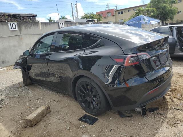 Photo 2 from auction – 2023 TESLA MODEL Y with VIN 7SAYGAEE6PF621251
