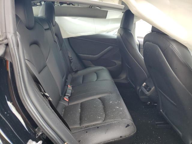 Photo 10 from auction – 2022 TESLA MODEL 3 with VIN 5YJ3E1EBXNF129788