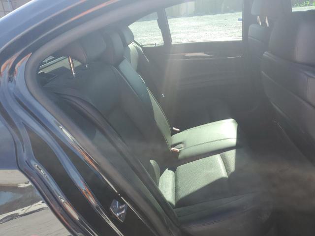 Photo 10 from auction – 2011 BMW 750 I with VIN WBAKA8C51BCY37110