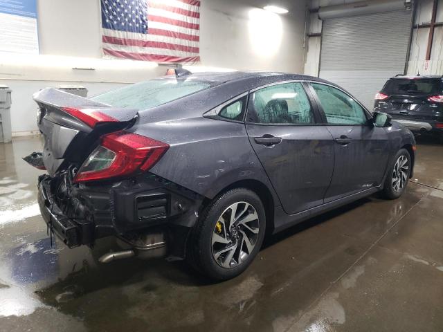 Photo 3 from auction – 2018 HONDA CIVIC EX with VIN 19XFC2F76JE032218