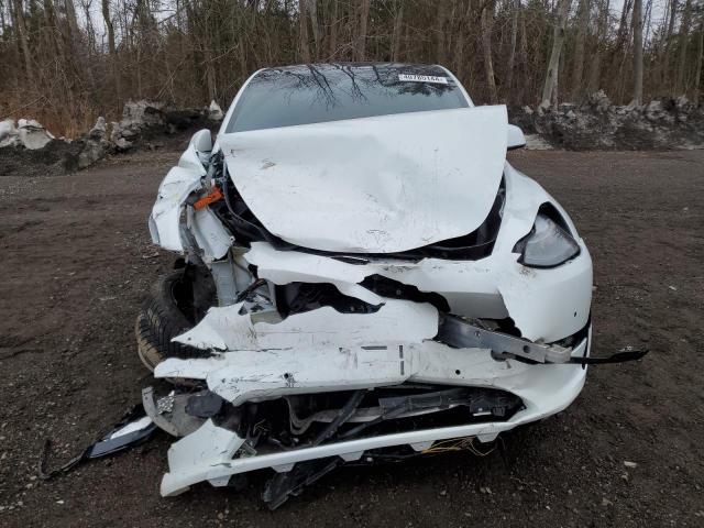 Photo 5 from auction – 2022 TESLA MODEL Y with VIN 7SAYGAEE3NF531830