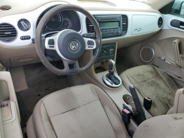 Photo 8 from auction – 2014 VOLKSWAGEN BEETLE with VIN 3VWJ17AT5EM645862