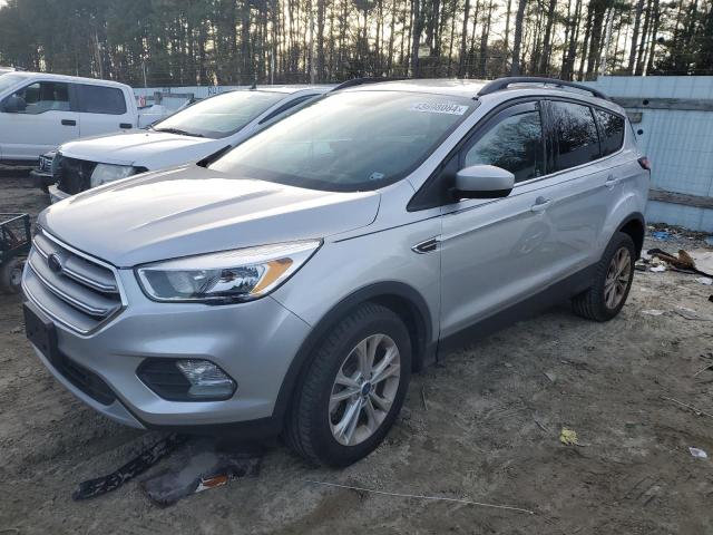 FORD ESCAPE SE 2018 with VIN 1FMCU9GD6JUC84478 - Photo from auction