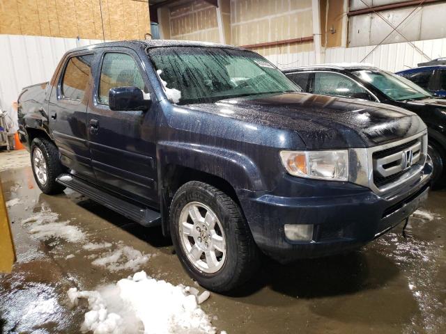 Photo 4 from auction – 2011 HONDA RIDGELINE with VIN 5FPYK1F4XBB008308