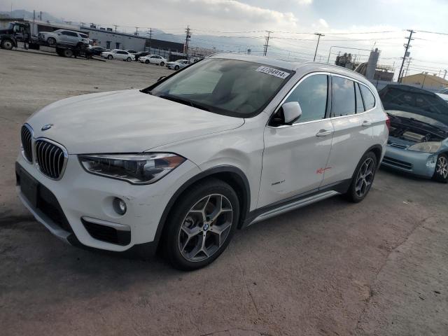 BMW X1 XDRIVE2 2016 with VIN WBXHT3C3XG5E56219 - Photo from auction