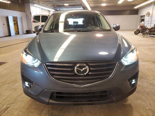 Photo 5 from auction – 2016 MAZDA CX-5 GT with VIN JM3KE4DY0G0641880