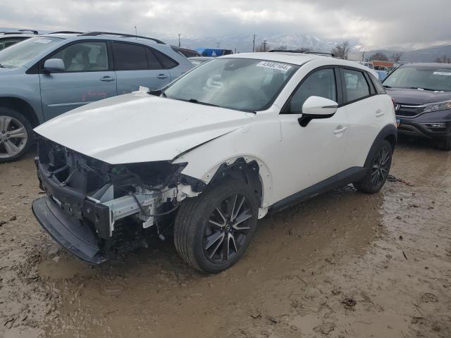MAZDA CX-3 TOURI 2018 with VIN JM1DKFC74J0308880 - Photo from auction