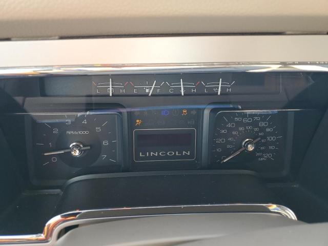 Photo 9 from auction – 2010 LINCOLN NAVIGATOR with VIN 5LMJJ2H5XAEJ07048