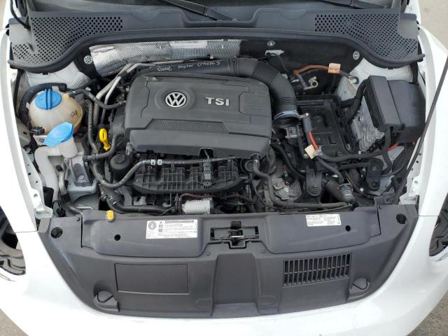 Photo 11 from auction – 2014 VOLKSWAGEN BEETLE with VIN 3VWJ17AT5EM645862