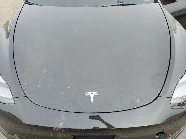 Photo 12 from auction – 2023 TESLA MODEL Y with VIN 7SAYGAEE9PF919843