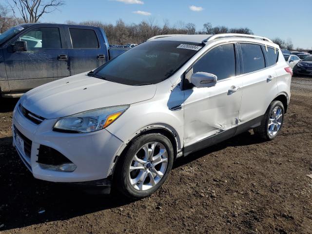 FORD ESCAPE TIT 2014 with VIN 1FMCU9J90EUC59621 - Photo from auction