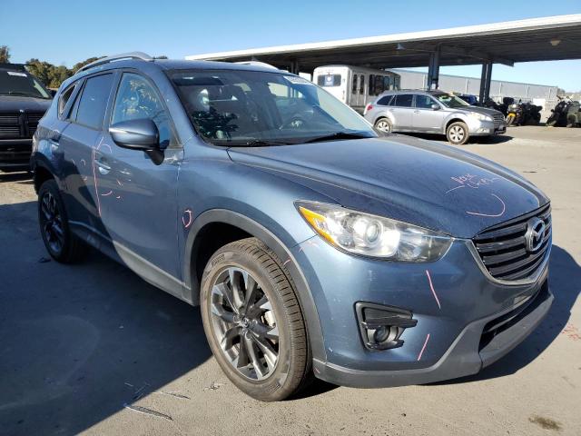 Photo 4 from auction – 2016 MAZDA CX-5 GT with VIN JM3KE2DYXG0789474