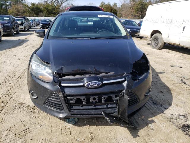 Photo 5 from auction – 2014 FORD FOCUS TITA with VIN 1FADP3J20EL457465