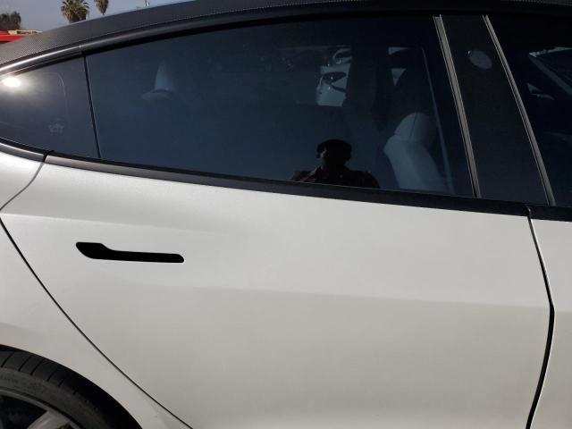 Photo 10 from auction – 2022 TESLA MODEL 3 with VIN 5YJ3E1EC0NF209304