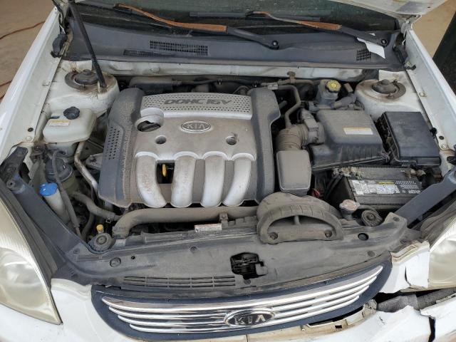 Photo 11 from auction – 2006 KIA OPTIMA LX with VIN KNAGE123865062073