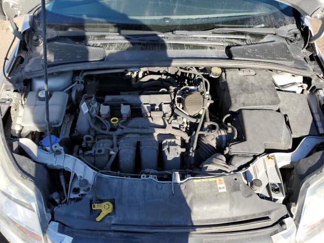 Foto 11 de la subasta – 2014 FORD FOCUS SE con VIN 1FADP3K22EL107463