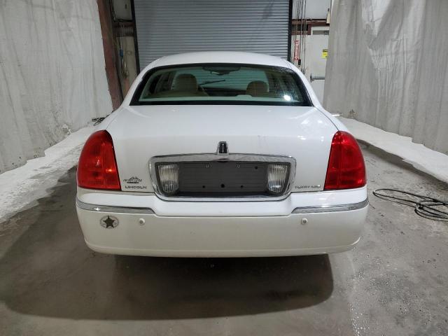 Photo 6 from auction – 2004 LINCOLN TOWN CAR E with VIN 1LNHM81W94Y683540