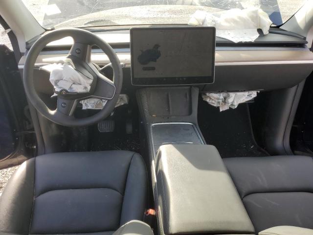 Photo 8 from auction – 2023 TESLA MODEL Y with VIN 7SAYGAEE7PF802469