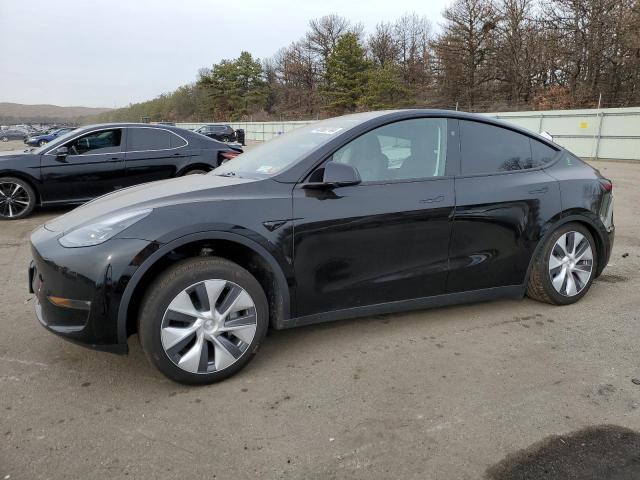 TESLA MODEL Y 2023 with VIN 7SAYGAEE9PF919843 - Photo from auction