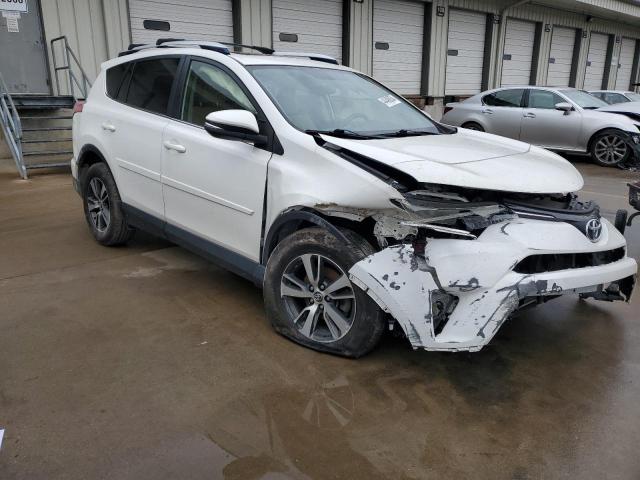 Photo 4 from auction – 2016 TOYOTA RAV4 XLE with VIN JTMRFREV9GJ057011