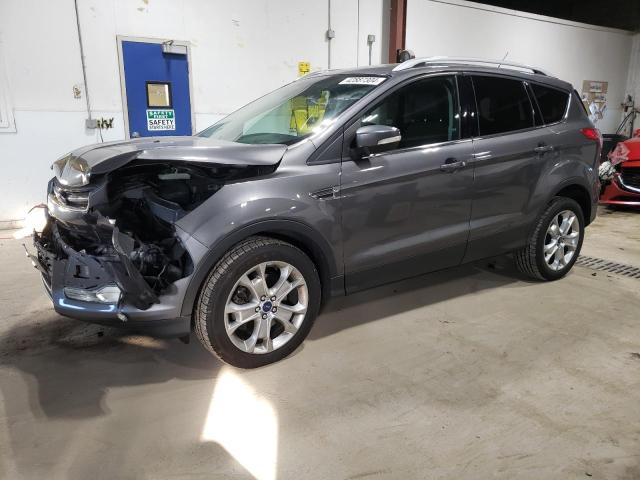 FORD ESCAPE TIT 2014 with VIN 1FMCU9J9XEUA52833 - Photo from auction