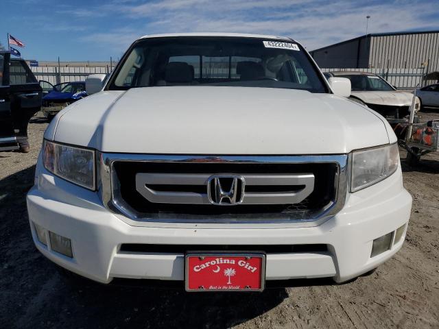 Photo 5 from auction – 2011 HONDA RIDGELINE with VIN 5FPYK1F54BB007566