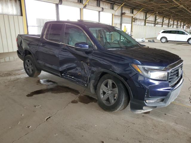 Photo 4 from auction – 2023 HONDA RIDGELINE with VIN 5FPYK3F57PB022291