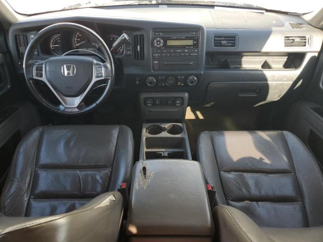 Photo 8 from auction – 2014 HONDA RIDGELINE with VIN 5FPYK1F51EB013538