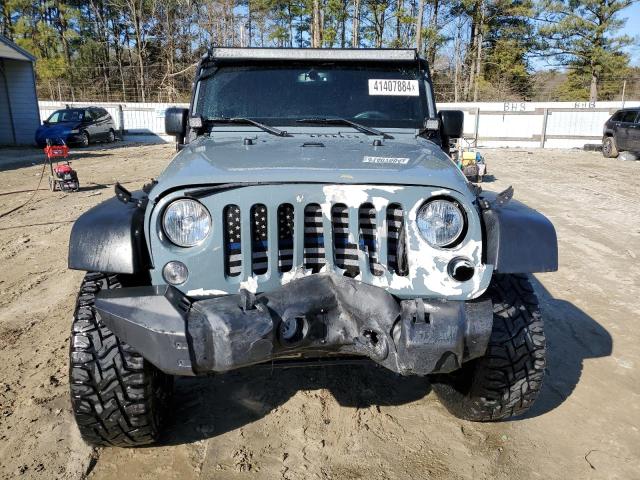 Photo 5 from auction – 2015 JEEP WRANGLER U with VIN 1C4BJWFG8FL651428