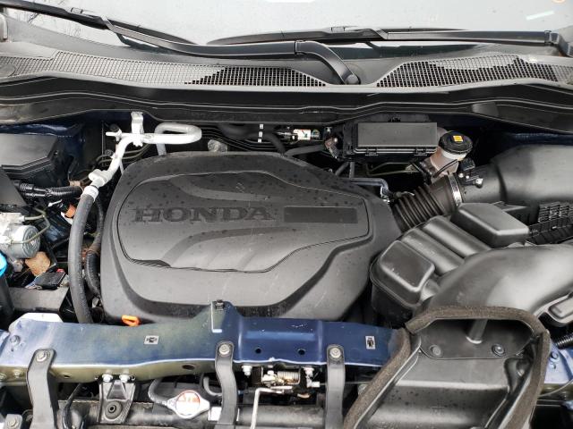 Photo 11 from auction – 2023 HONDA PASSPORT E with VIN 5FNYF8H09PB004712
