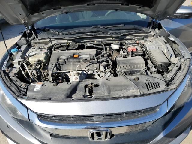 Photo 11 from auction – 2018 HONDA CIVIC EX with VIN 19XFC2F7XJE007970