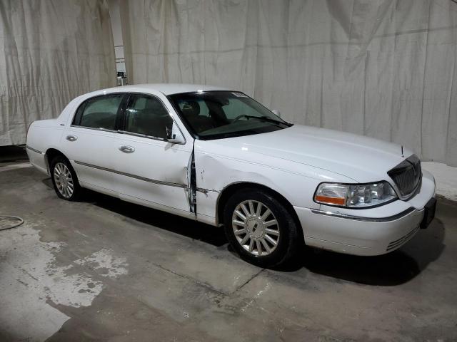 Photo 4 from auction – 2004 LINCOLN TOWN CAR E with VIN 1LNHM81W94Y683540