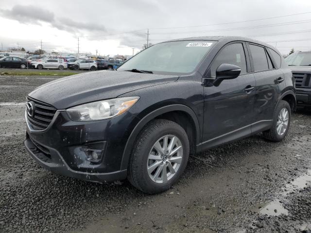 Photo 1 from auction – 2016 MAZDA CX-5 TOURI with VIN JM3KE4CYXG0723004