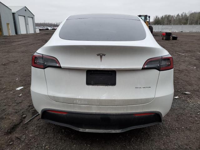 Photo 6 from auction – 2022 TESLA MODEL Y with VIN 7SAYGAEE3NF531830