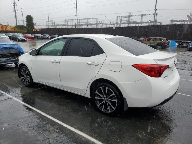Photo 2 from auction – 2017 TOYOTA COROLLA L with VIN 5YFBURHE0HP573550