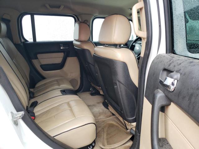 Photo 11 from auction – 2006 HUMMER H3 with VIN 5GTDN136168168919